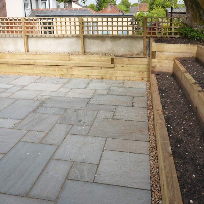 Image 6, Main patio and terraced sleepers. Garden Landscaping & Terracing, Buckinghamshire. New Driveway Company