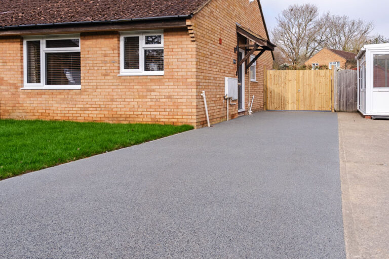Resin Bound Driveway and Porcelain Patio, Abingdon. New Driveway Company