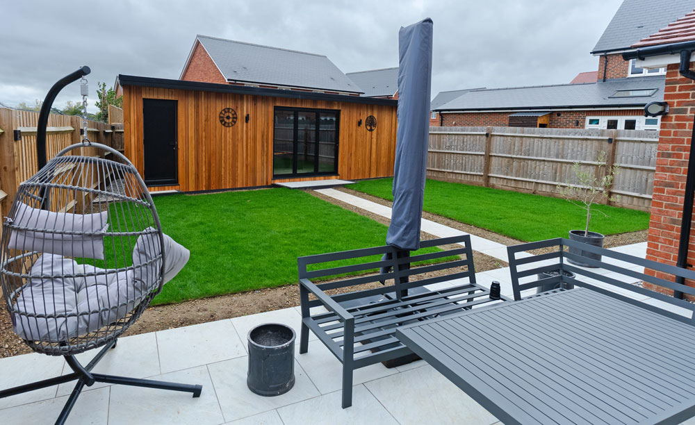Side view of new porcelain patio and garden path Porcelain Patio and Garden Paths, Benson, Oxfordshire. New Driveway Company