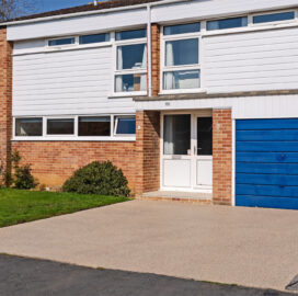 Side view from road of resin bound gravel driveway Resin Gravel Driveway and Porcelain Step, Enysham, Witney. New Driveway Company