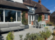 Vala Grey porcelain patio with table and chairs