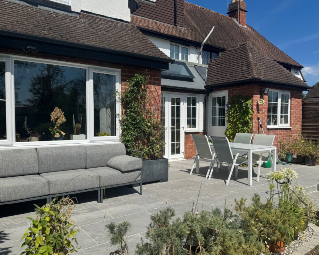 Vala Grey porcelain patio with table and chairs