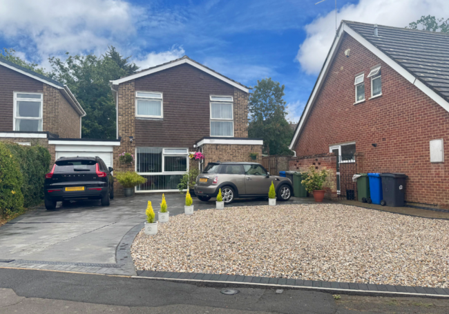 New gravel driveway with block edging