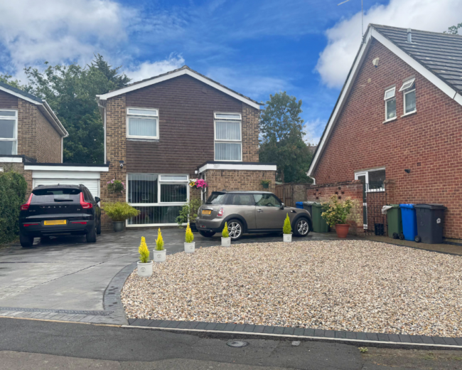 New gravel driveway with block edging