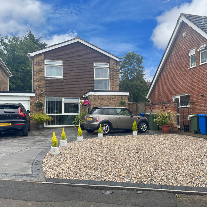New gravel driveway with block edging