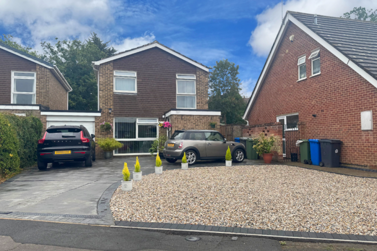 New gravel driveway with block edging