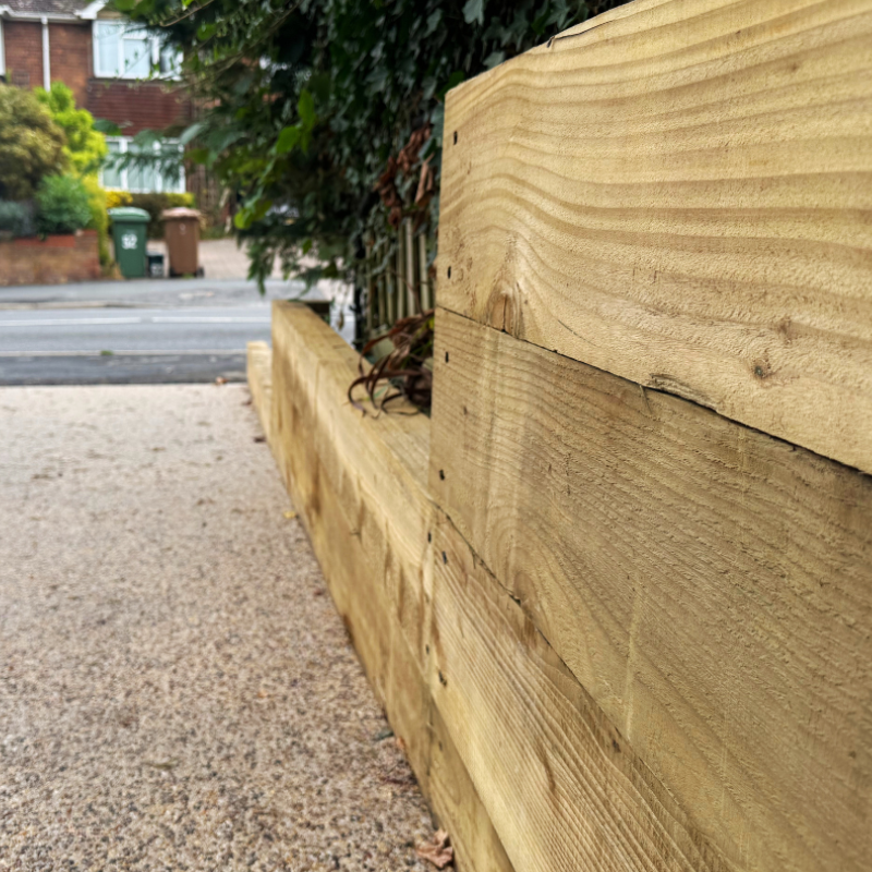 Close up of new sleepers on resin driveway