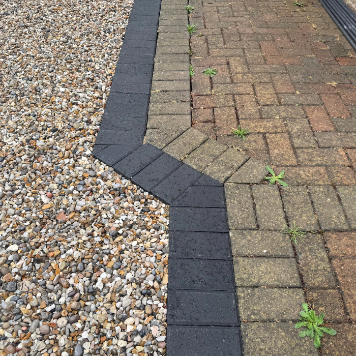 New block paving against neighbours block paving